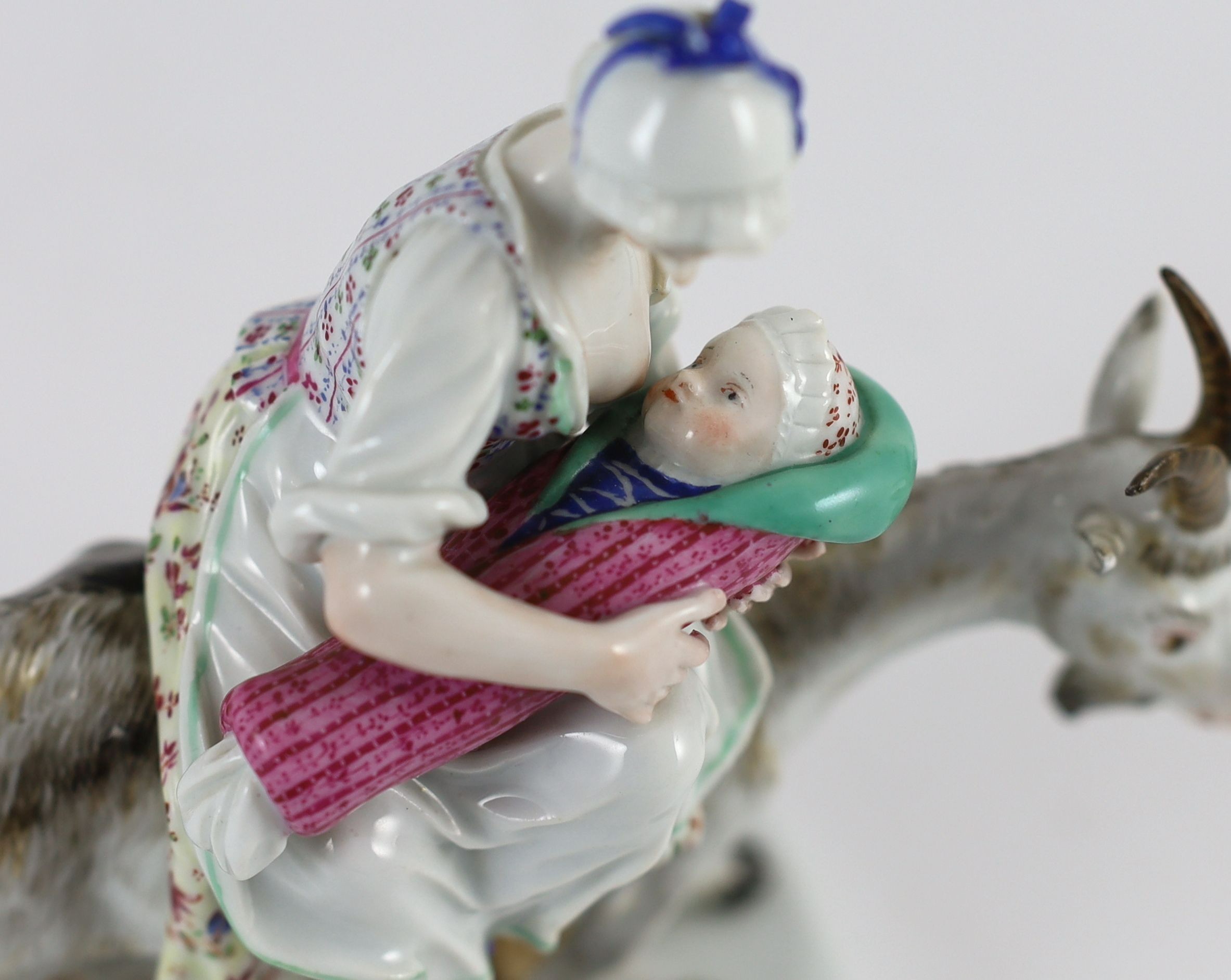 A Meissen group of the tailor’s wife riding a goat, 19th century, 18 cm high